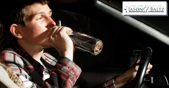 Underage driver drinking alcohol